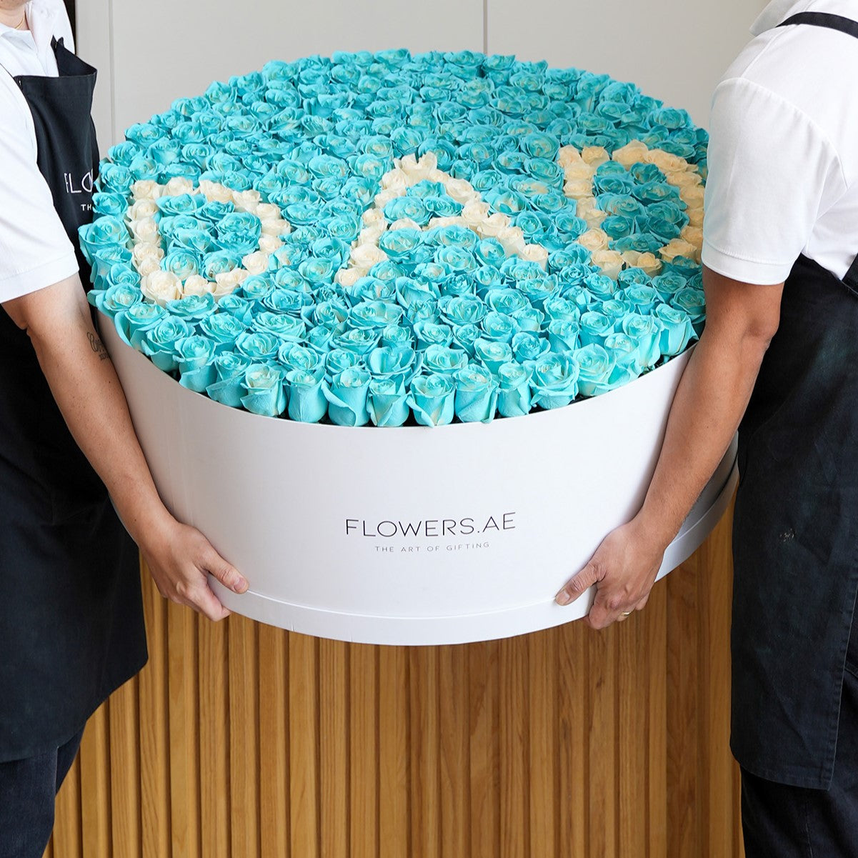 Luxury oversized DAD blue rose hatbox arrangement by Flowers.ae for Father's Day delivery in Dubai
