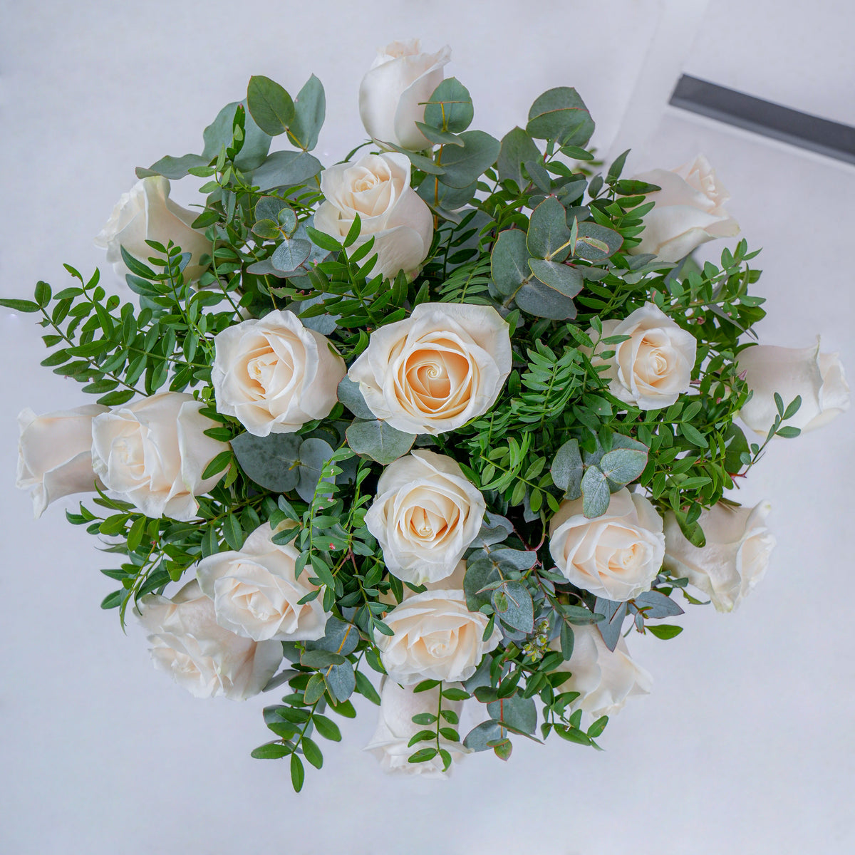 White Roses with greens