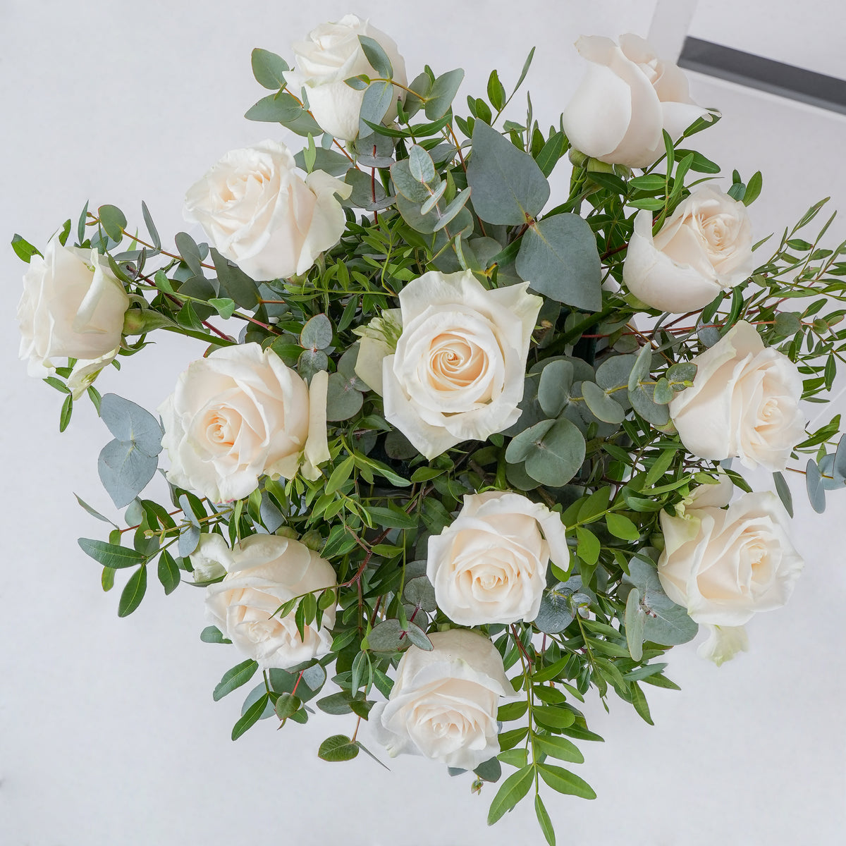White Roses with greens
